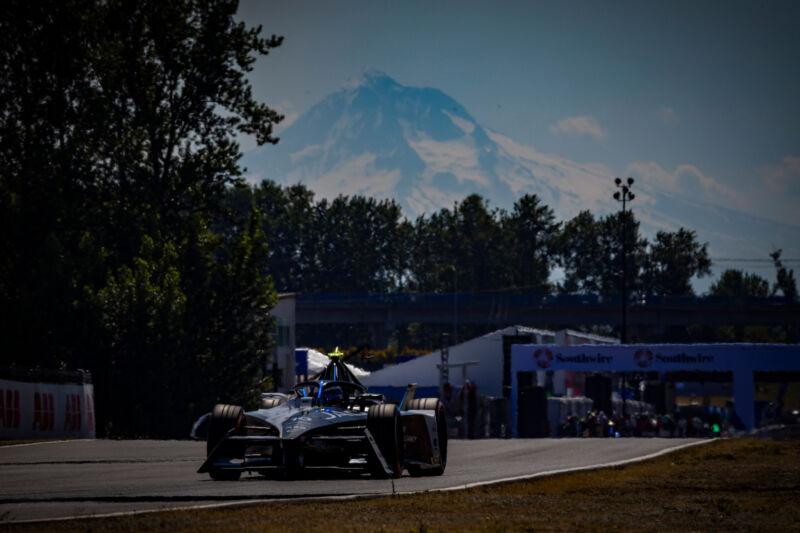 A Jaguar Formula E car with Mt Hood in the background