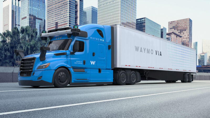 A Waymo Via truck. Check out all that self-driving equipment on the front.