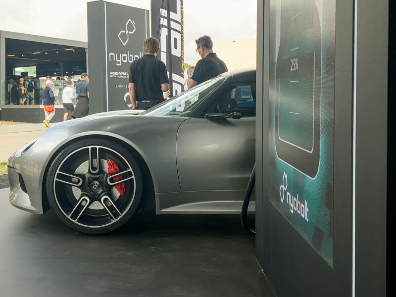 The Nyobolt EV pokes out from its stand at the 2023 Goodwood Festival Of Speed